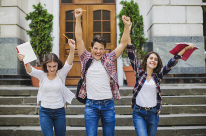 cheerful-students-celebrating