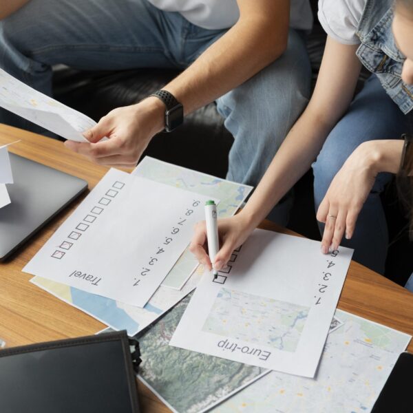 close-up-people-planning-trip